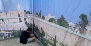 Nitzan building a Panoramic Sukkah Kit